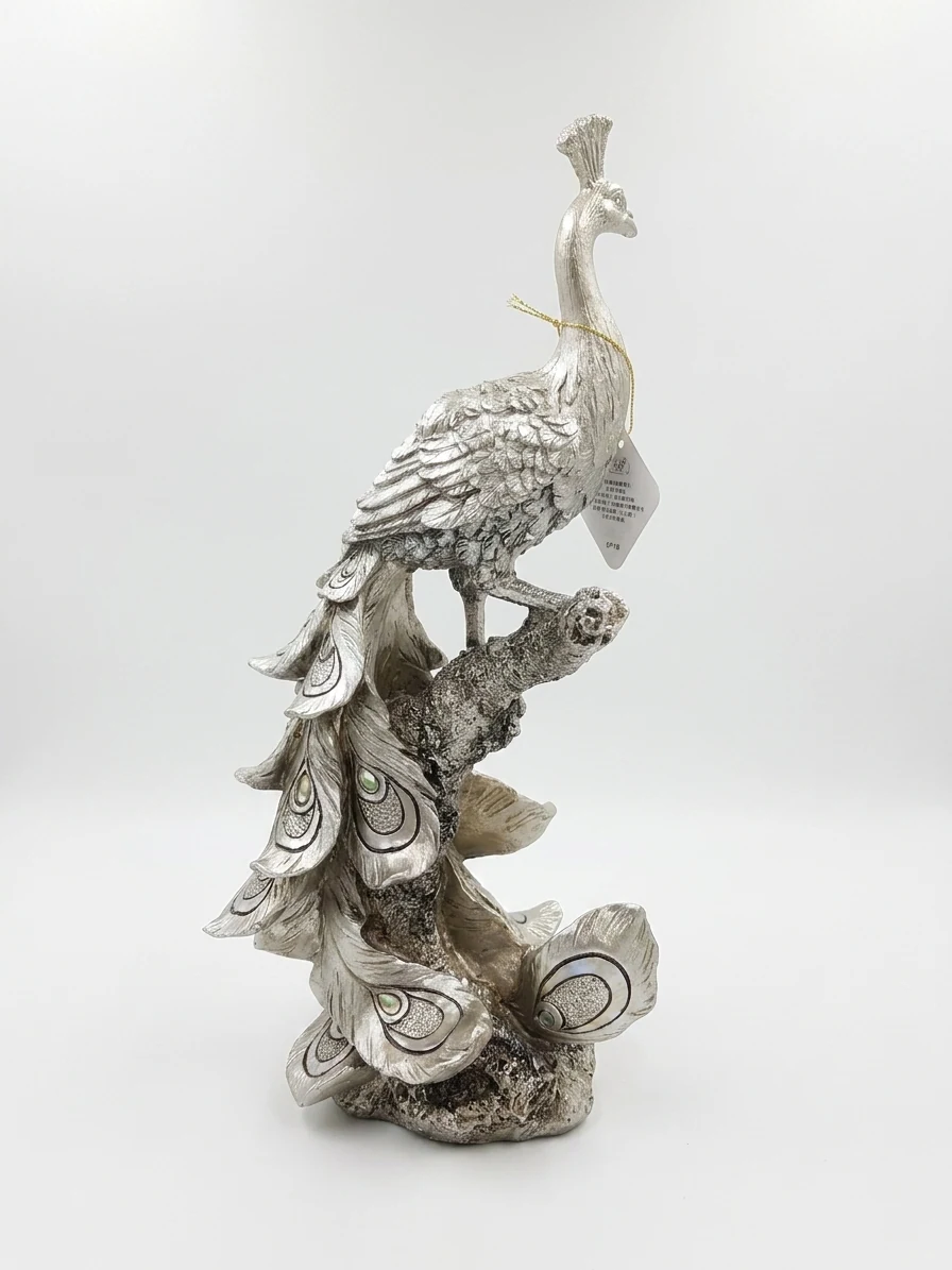 Silver Radiance Peacock Sculpture